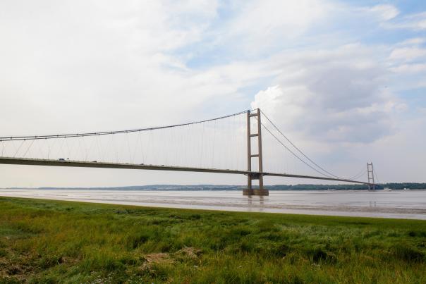 Image shows Humber Bridge towering over the Wash in North Lincolnshire