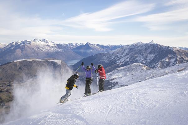 Three Friends Skiing Coronet Peak