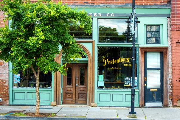 Store front of Pretentious Beer Co in the Old City neighborhood of Knoxville