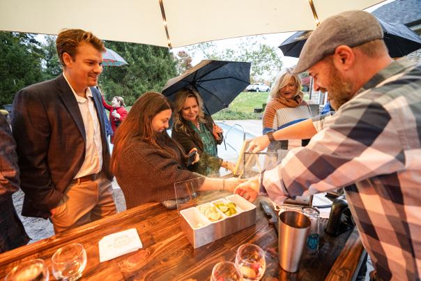 Friends Enjoying Bourbon's Backyard drinks