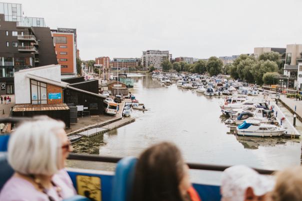 a view of brayford pool in Lincoln from an open top sightseeing bus