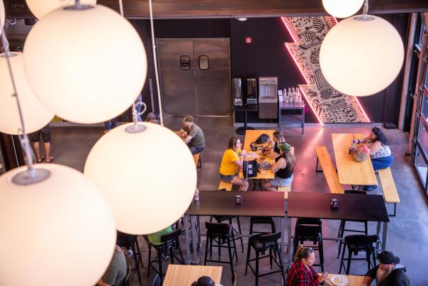 Fun lighting and people dining at Brewhalla