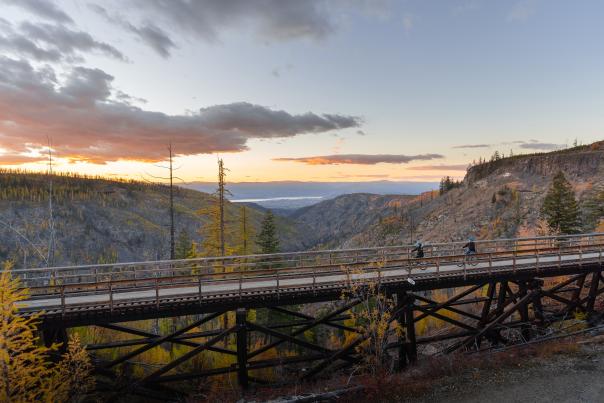 Couple Biking at Myra Canyon Trestles