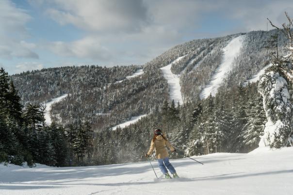 Woman skiing down Gore Mountain