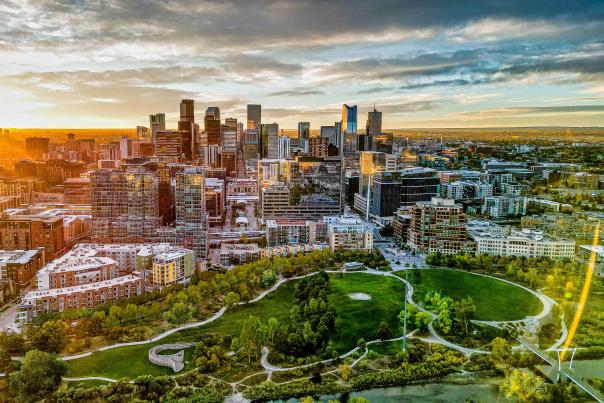 An aerial view of the Denver, Colorado, skyline during sunrise.