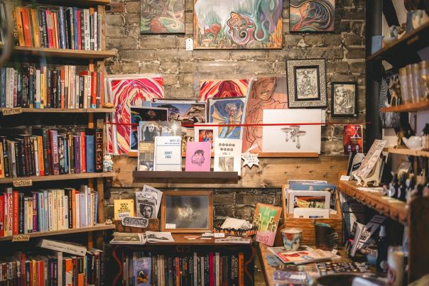 A collection of vintage books and record discs.