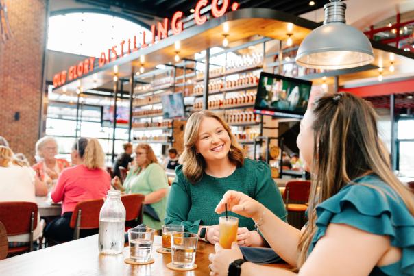 Women enjoying drinks at the restaurant at Old Glory.