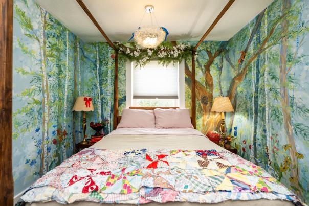 bedroom painted with forest murals