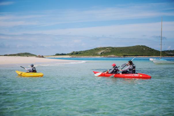 Family in kayaks
