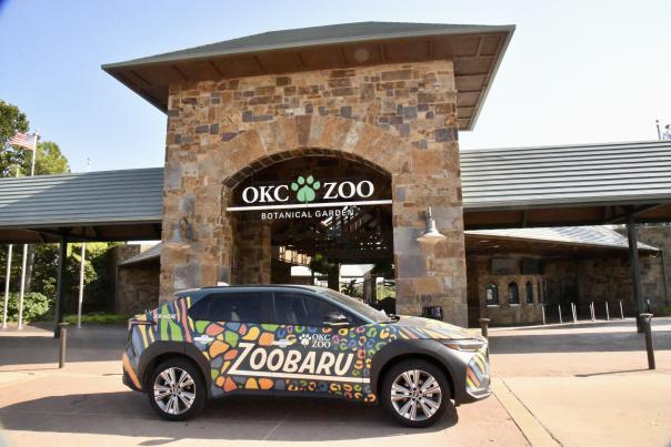 A photo of Oklahoma City Zoo's new "ZOObaru," an electric car with OKC Zoo branding in celebration of World EV Day.