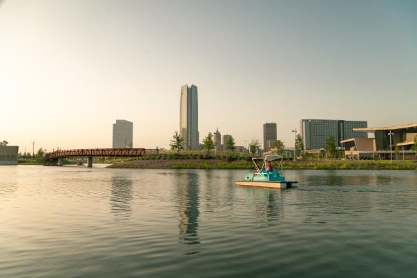 Paddle boats on the lake at Scissortail Park