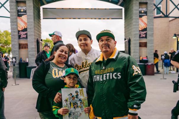 Family of four at an Athletics game in Sacramento