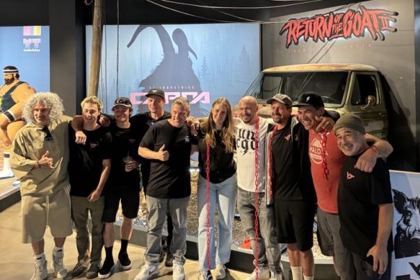 Founder of YT Mill poses with sponsored athletes during opening ceremonies.