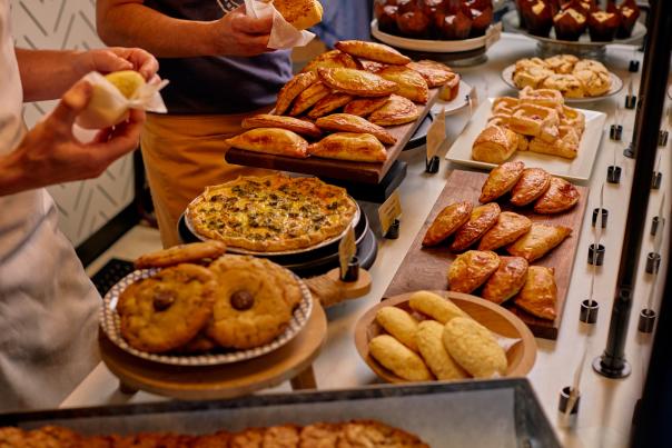 Assorted pastries in a bakery case.