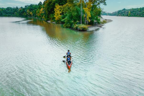 Two women paddling in canoe
