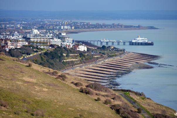 Aerial view of the coastline, sea and pier at Eastbourne