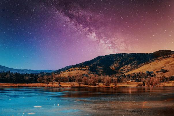 Pink and blue hues and starts in the sky at Wonderland Lake Park