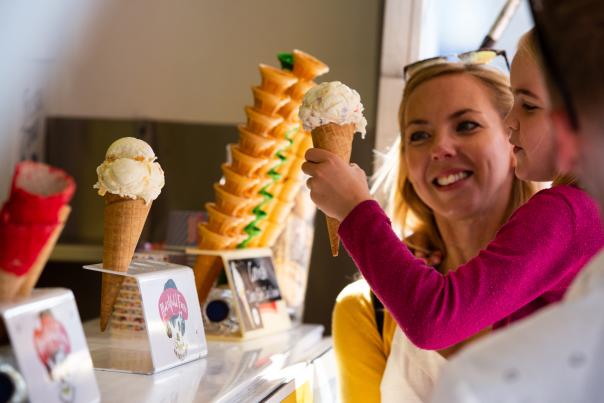 Family buying an ice-cream at Swanage Beach, Dorset