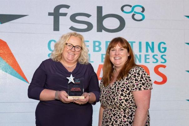 team from cofton holidays winning award