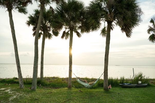 man lying in hammock