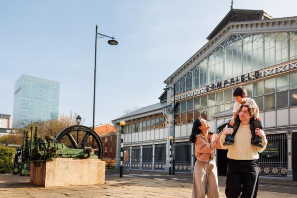 family outside campfield
