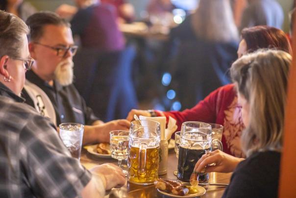 Beer steins and German food at Weiss Gasthaus restaurant