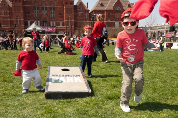Kids playing cornhole during Reds Opening Day Celebration at Washington Park (photo: Lowry Photo)