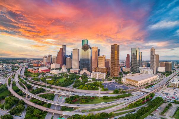 An aerial view of the Houston, Texas skyline at sunset
