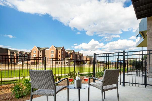View of Two Wine Glasses on Hotel Maverick Balcony