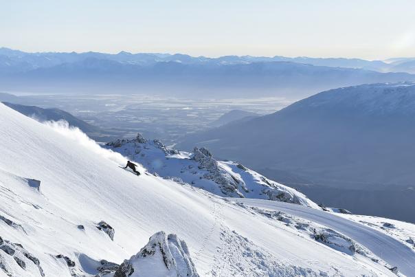 Snowboarder off psite at Cardrona Alpine Resort