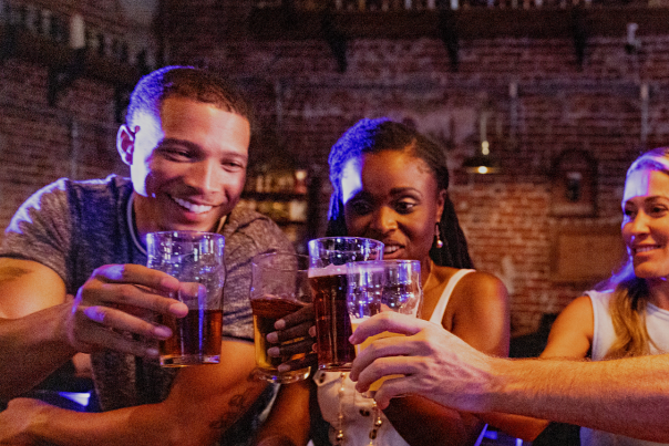 Four friends toasting at IceHouse Pub in Punta Gorda, Florida