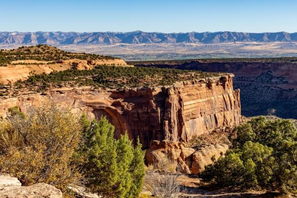 View of Colorado National Monument and Book Cliffs in Background