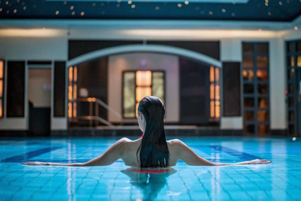 Careys Manor - Woman in the spa swimming pool