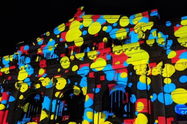 Memorial Hall in downtown Cincinnati lighted up red, orange and blue for BLINK