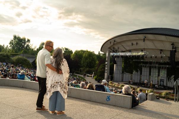 Couples enjoying a summer concert at the Frederik Meijer Gardens and Sculpture Park, 2023