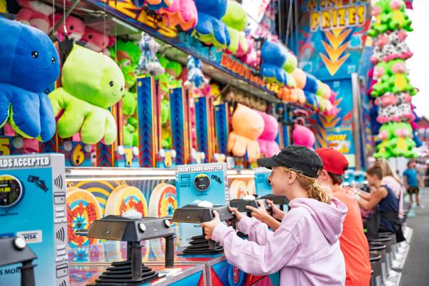 A little girl enjoys the games at the Wayne County Fair in the Pocono Mountains of Pennsylvania.