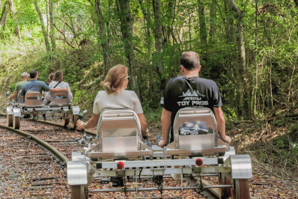 Bikers on Pedal-Assisted Rail Bikes