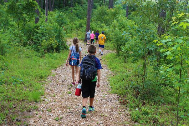 Howell Woods Summer Camp hiking trails and other fun activities.