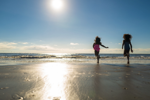 Girls Running on Beach