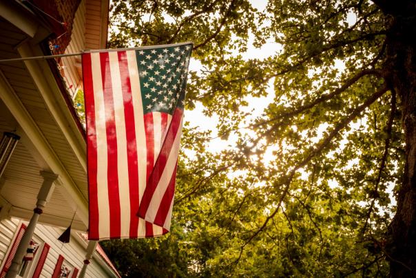 American flag on porch of house