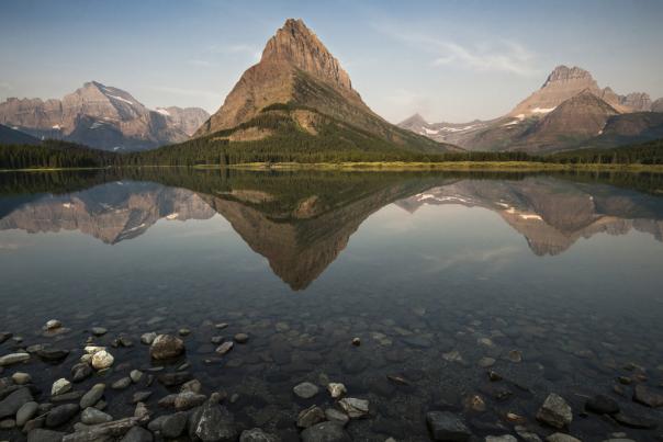 View Of A Mountain Reflected In A Lake At Glacier National Park