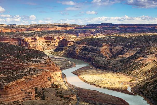 Colorado River through red rock canyons in Rabbit Valley