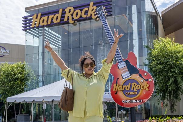Influencer standing outside Hard Rock in Cincinnati