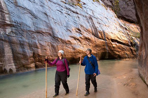 Hikers walking in Zion Narrows Wall Street