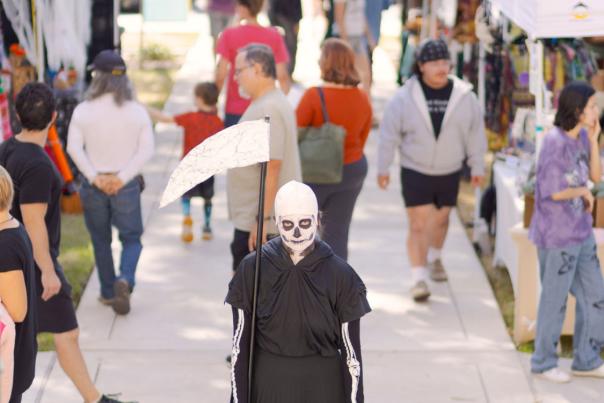 A grim reaper is dressed up and ready to shop at Art Squared in Downtown San Marcos