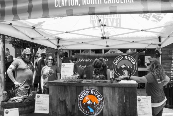 A tent set up selling beer from Deep River Brewery from Clayton, NC.