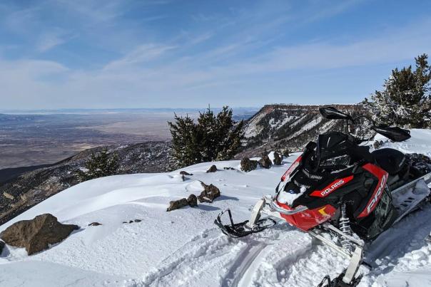 Snowmobile on the Edge of the Grand Mesa