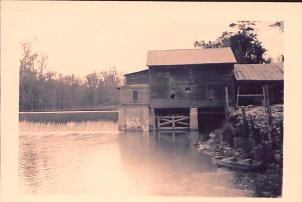 Historic photo of Atkinson's Mill from the river bank in Selma, NC.