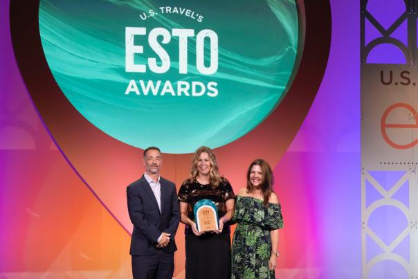 Mike Price, Sarah Miller, Amy Karbo holding ESTO Award