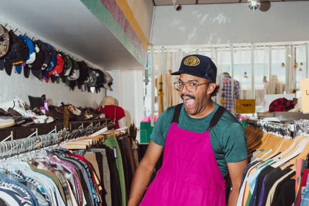 Someone very excited about being in a thrift store.